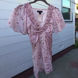 Cute shirt! Ties in back.