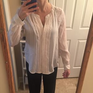 Ivory long sleeve button-down blouse with pleats