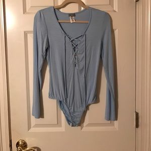light blue lace-up bodysuit