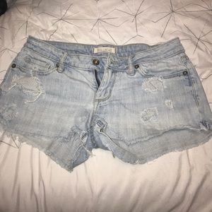 Distressed Blue-Washed denim shorts