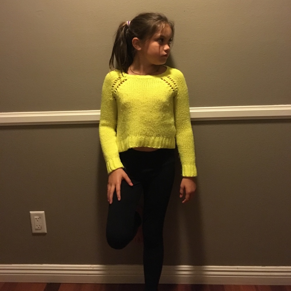 Black pants and neon crop top