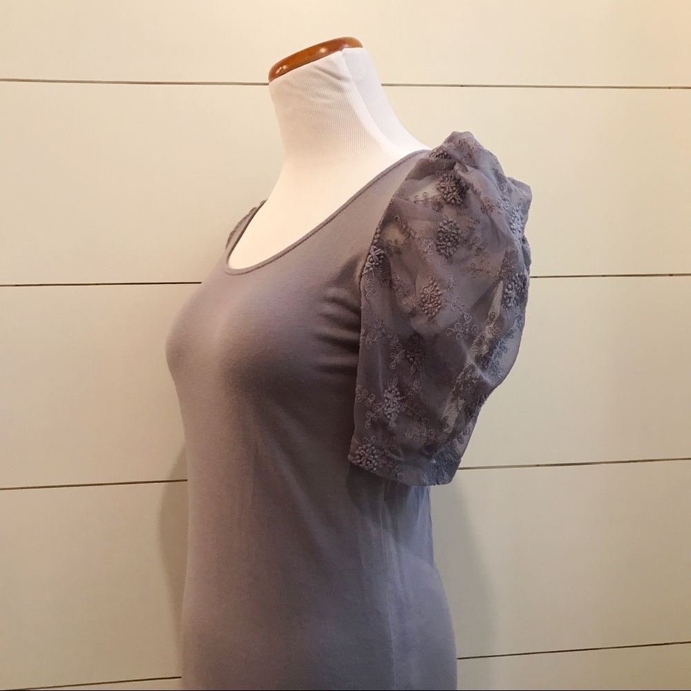 (A) Anthropologie grey top with lace sleeves.