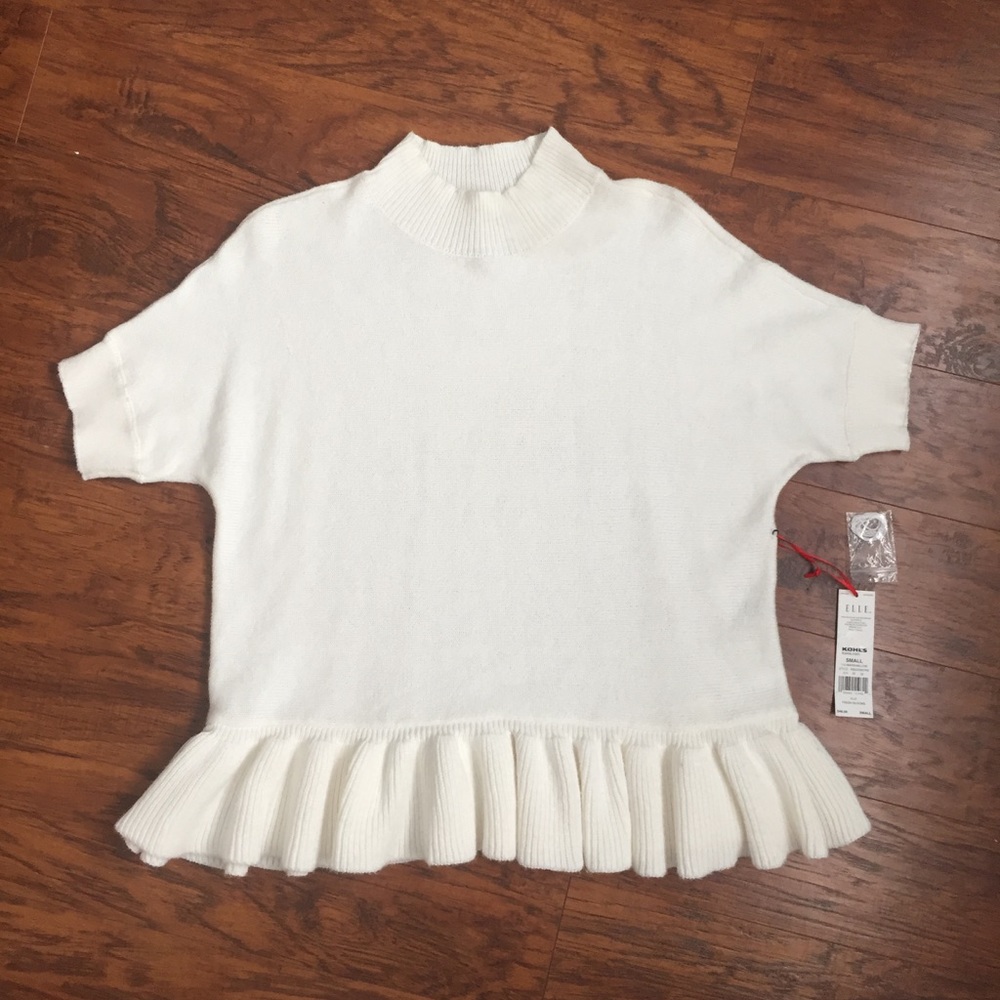 Nwt cute oversized sweater with peplum details