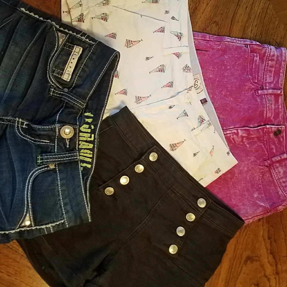 SOLD.    4 pairs of shorts size 0