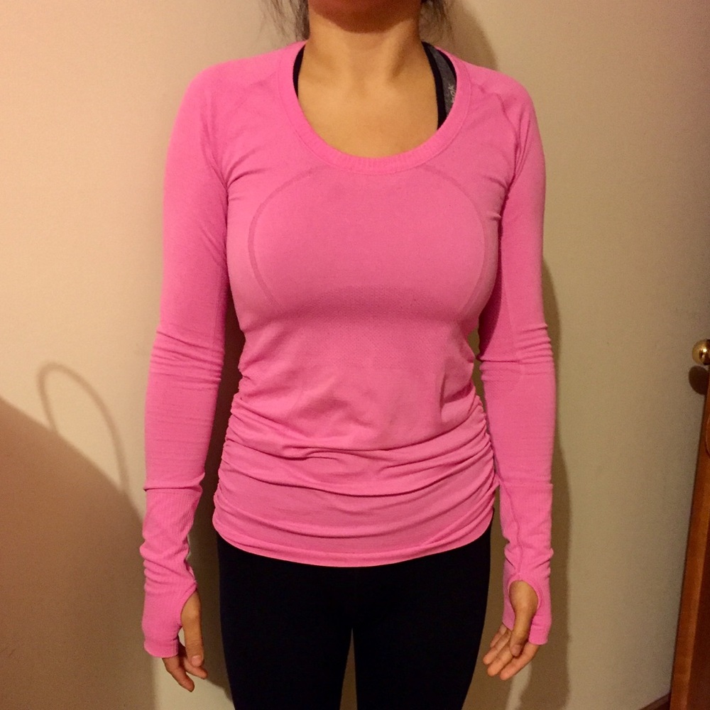 Pink lululemon swiftly tech top