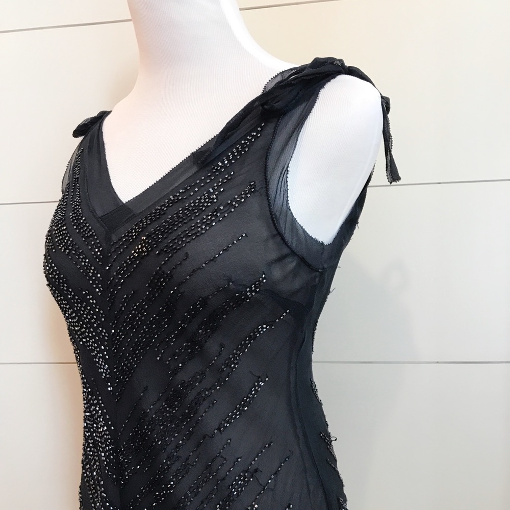 (A) Express "Holiday" beaded black blouse