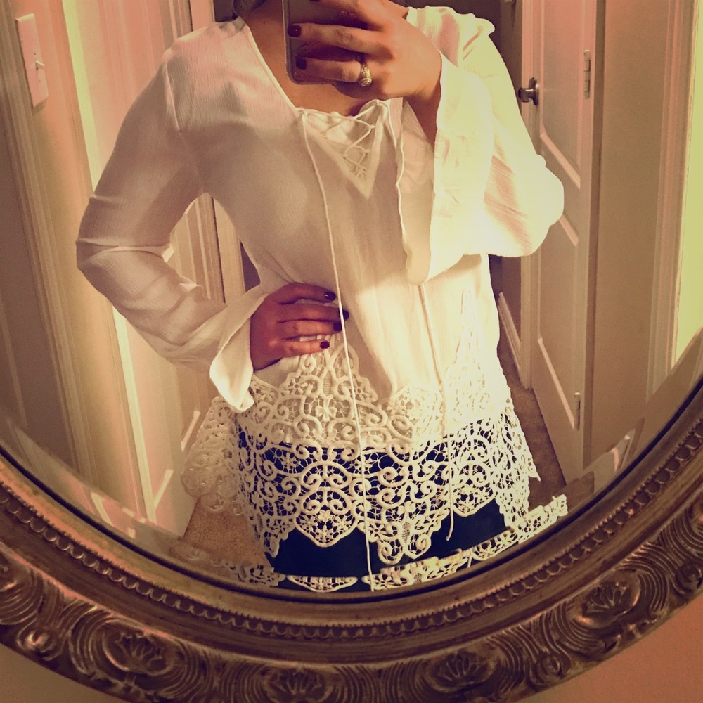 White ruffle top with lace embroidered bottom