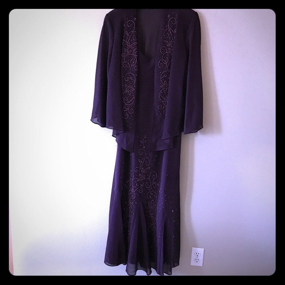 Tea length dress with jacket.