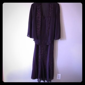 Tea length dress with jacket.