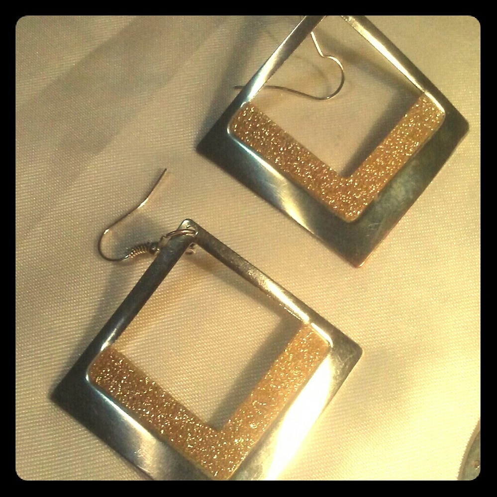 Two sets of gold colored earrings