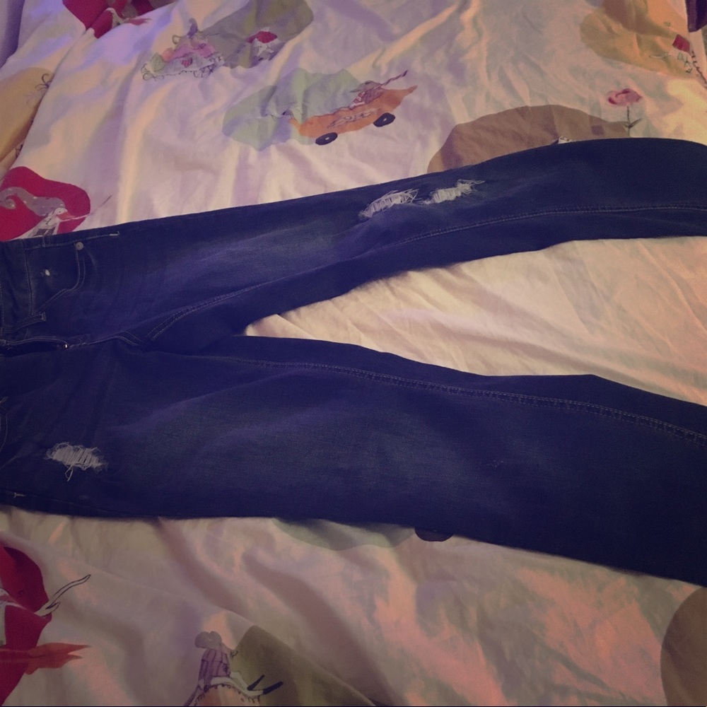 Kids ripped jeans.