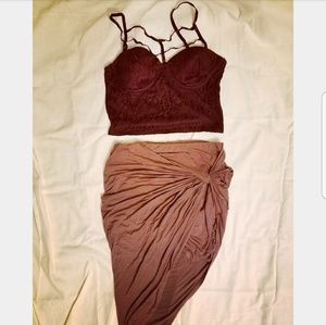 Crop strappy tank with ruched asymmetrical skirt.