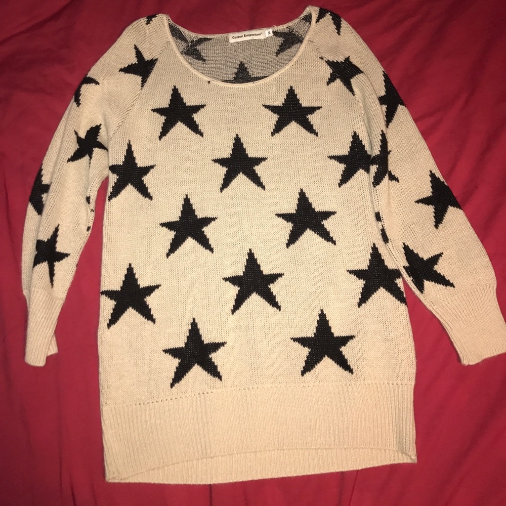Tan sweater with black stars