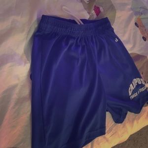 Campus track and field running shorts.