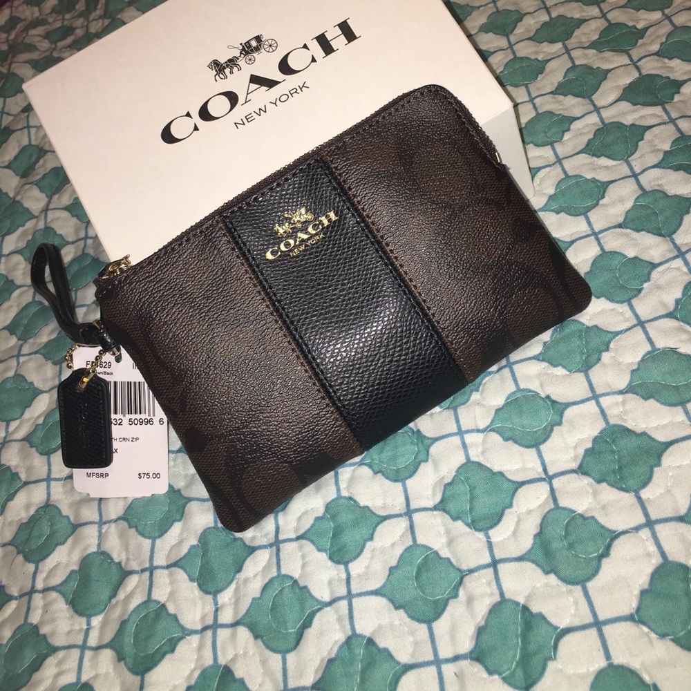 Brand new Coach leather wristlet