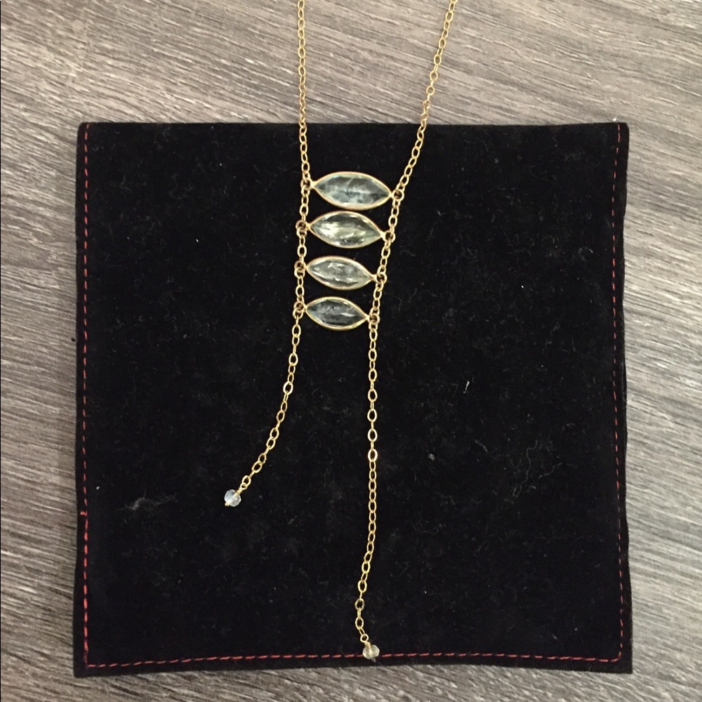 Aquamarine gemstone on gold-filled ladder necklace
