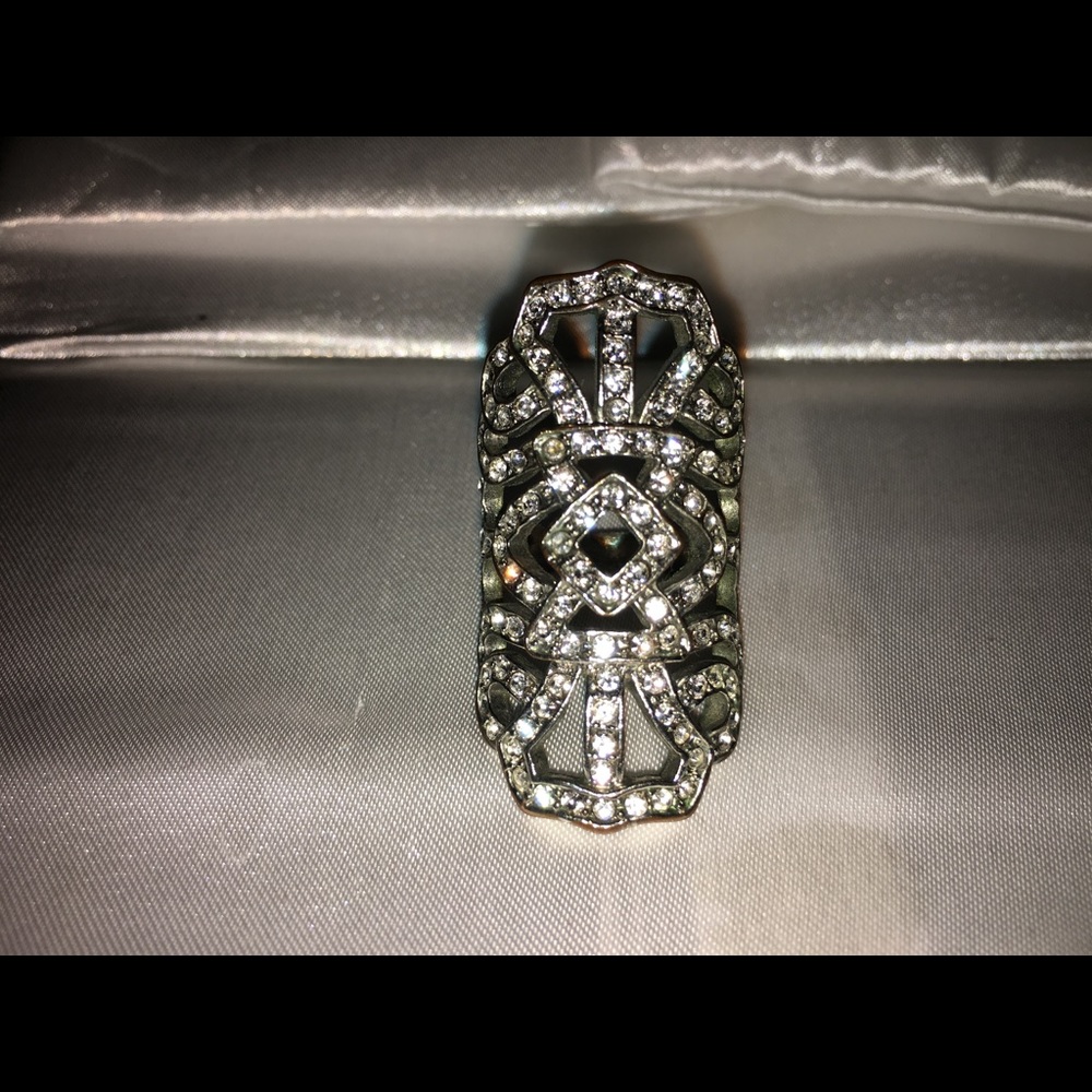 Large rhinestone ring.