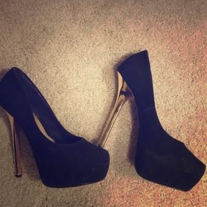 Black suede pumps