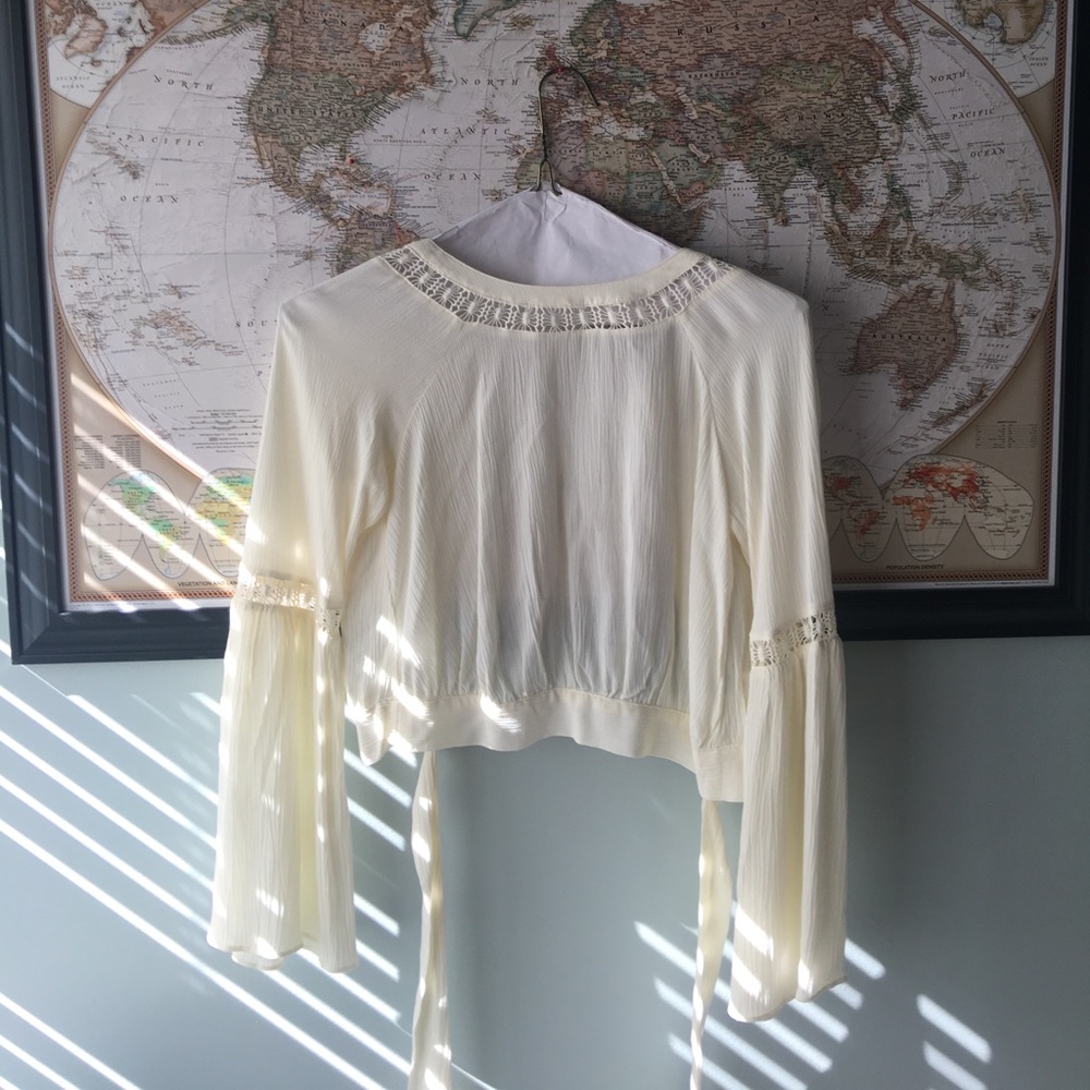 Cream blouse, open back. Size S