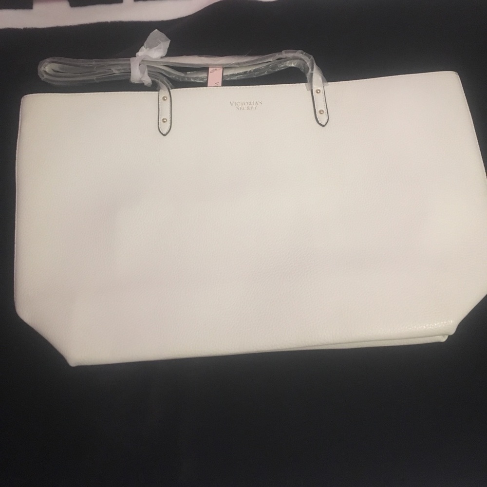 VS White flux leather bag with gold makeup bag