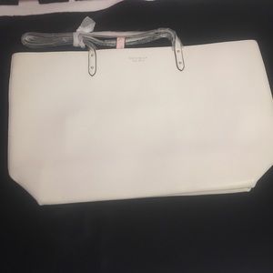 VS White flux leather bag with gold makeup bag