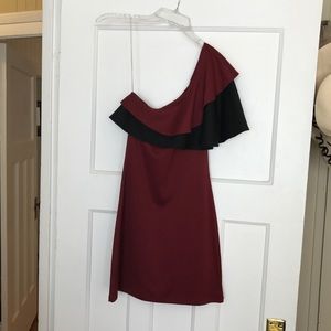 One shoulder ruffle tailgate dress