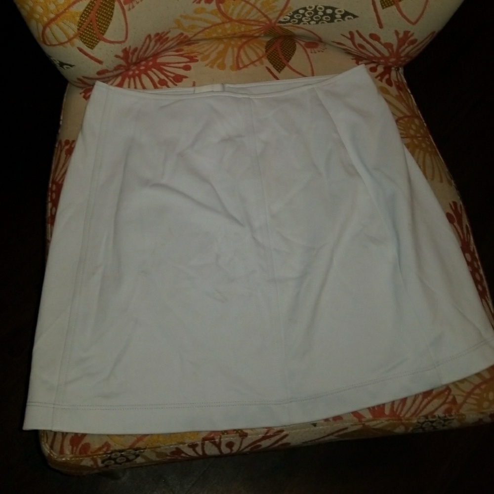 Baby blue leather mini skirts