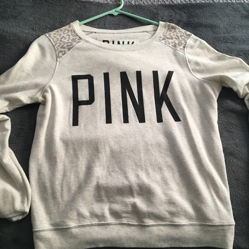 Pink thin long sleeve "sweater" shirt.