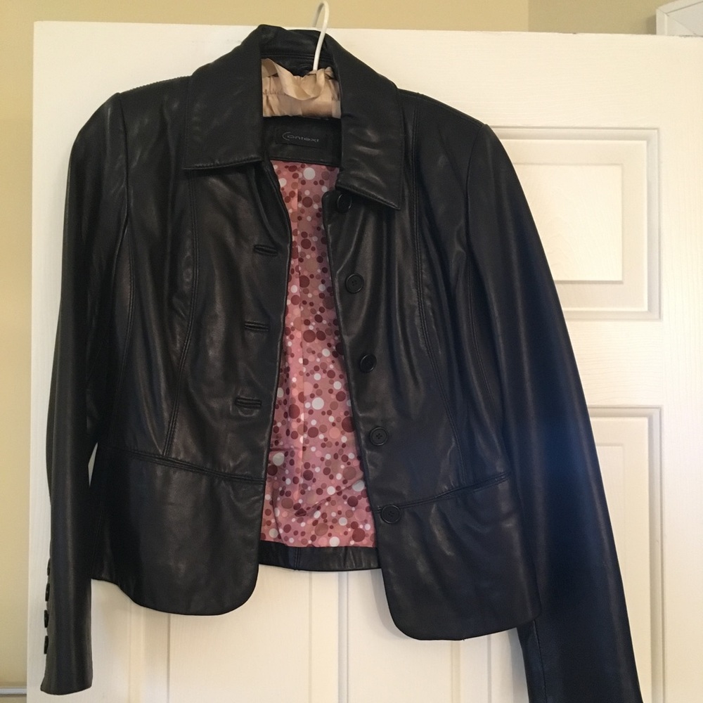 leather jacket w/ peplum back & buttons at wrist