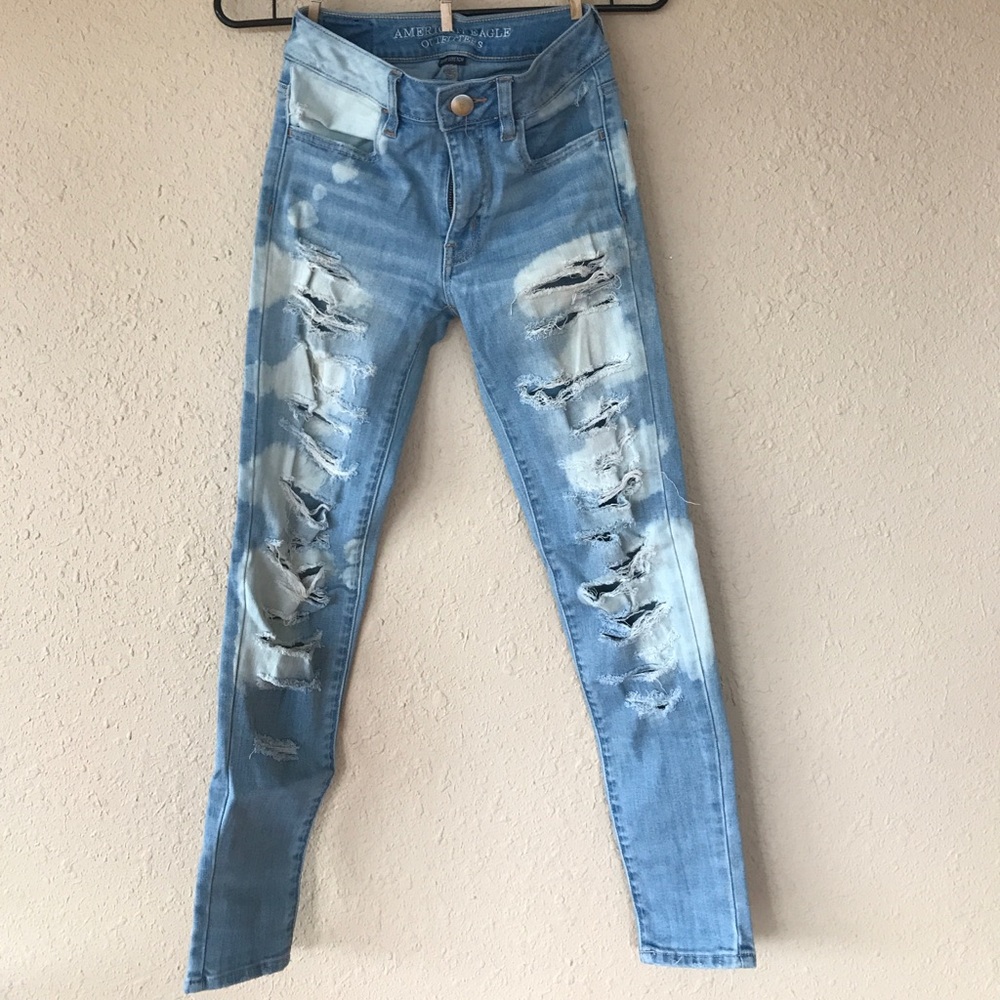 Acid wash ripped jeans