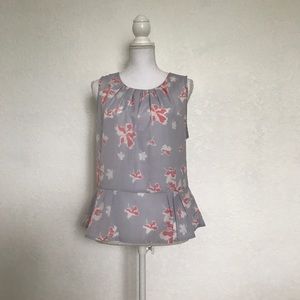 Cythnia Rowley peplum flower top