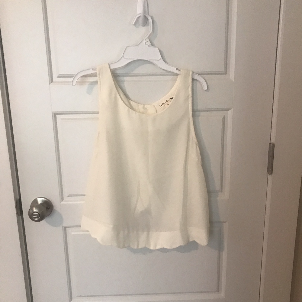 cream tank