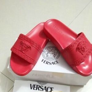 Red Versace flip flops