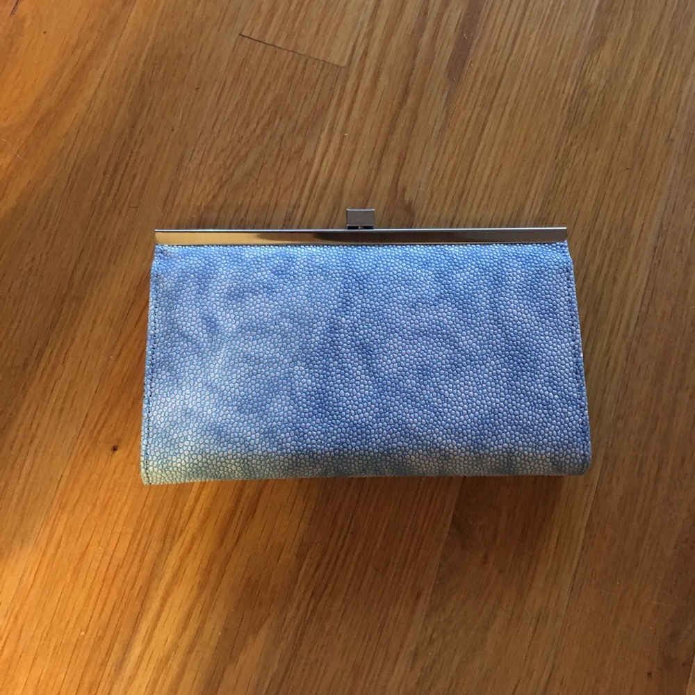 Baby blue clutch with dividers inside