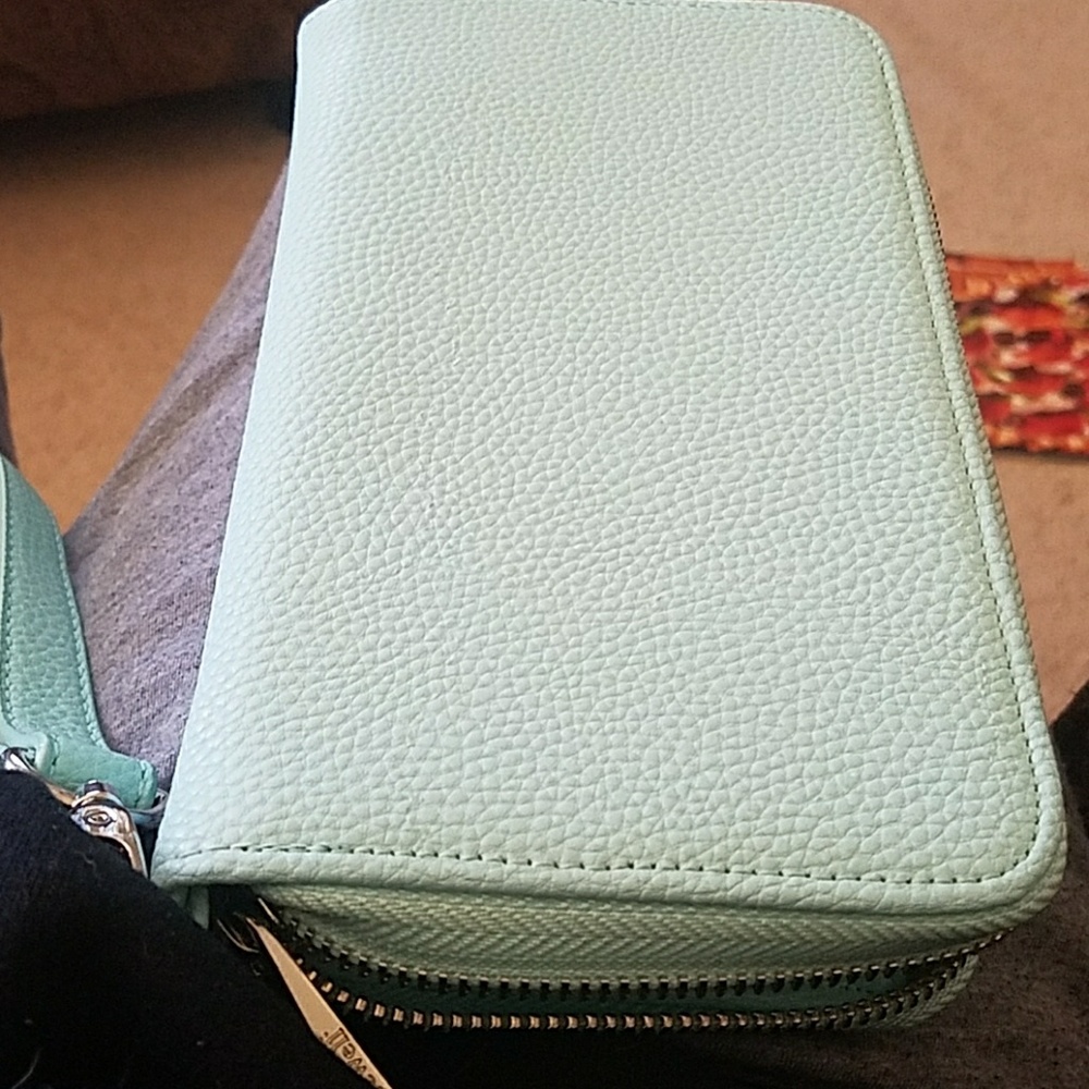 A nice light blue green wallet !