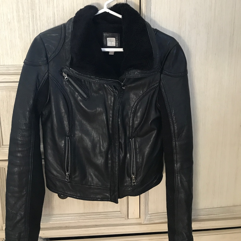 Leather jacket with faux fur lining