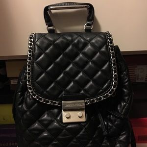 Backpack style Michael Kors purse