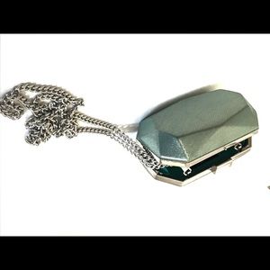 Aqua metallic clutch