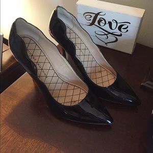 Black patent leather pumps