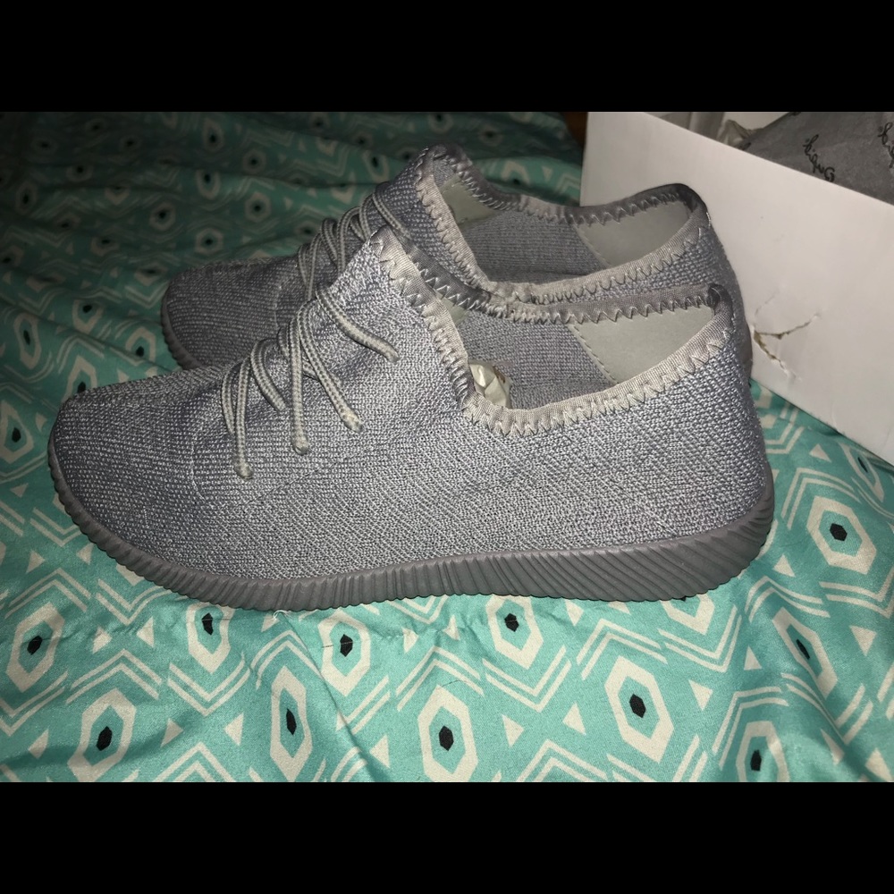 Grey tennis shoes! Never worn.