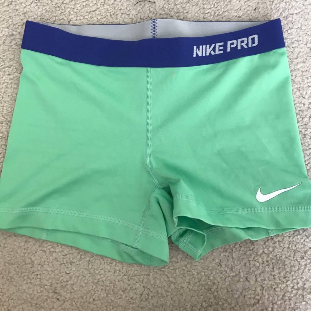 Nike Pro lime green and blue shorts