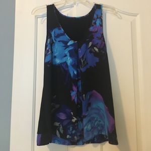 A loose, flowy black and blue tank.