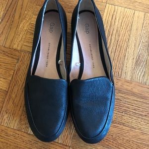 Black leather flats