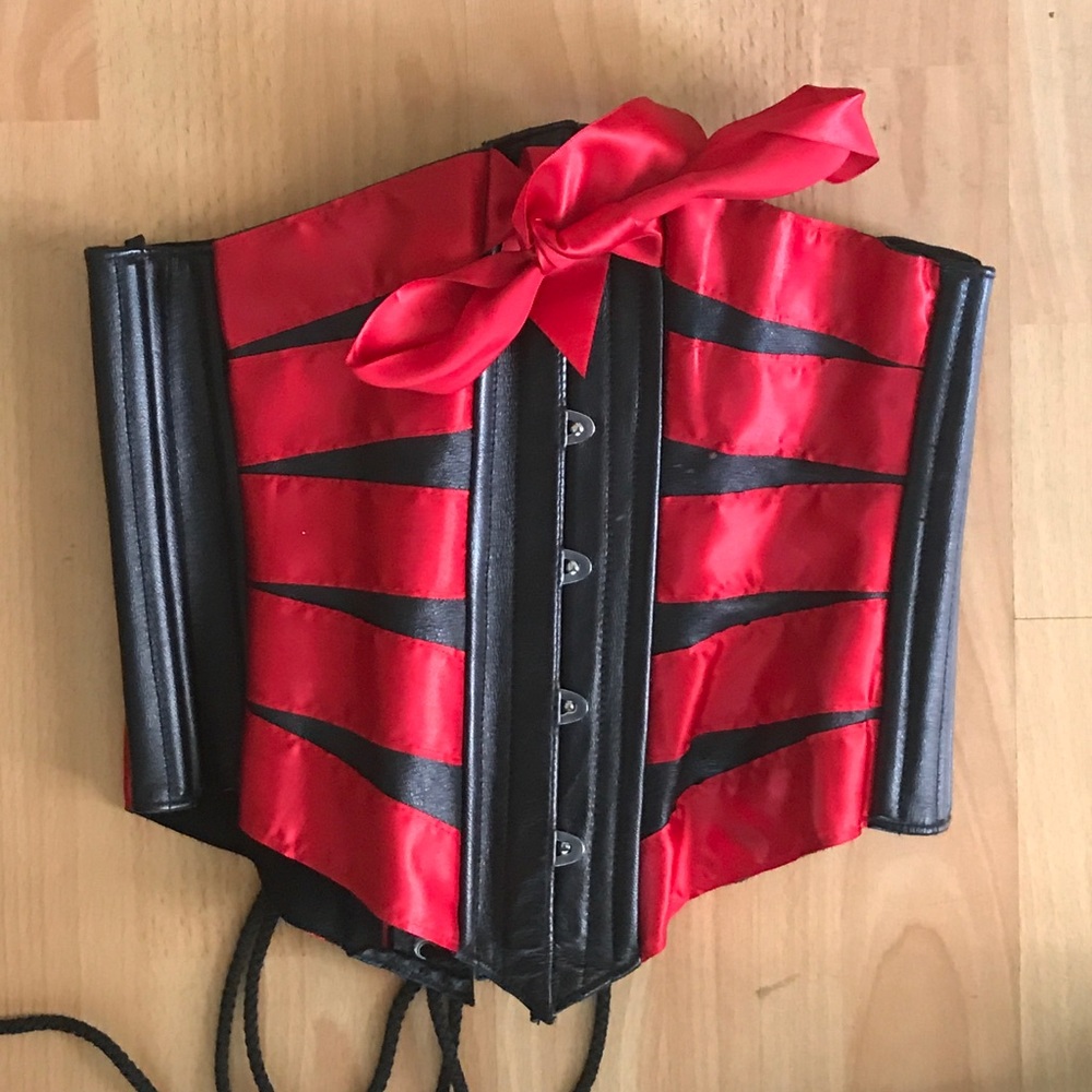 Leather Waist trainer/corset with red ribbon.
