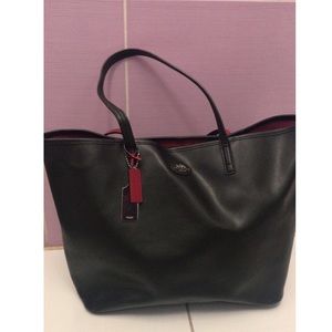 COACH leather tote with red/fuchsia inner lining