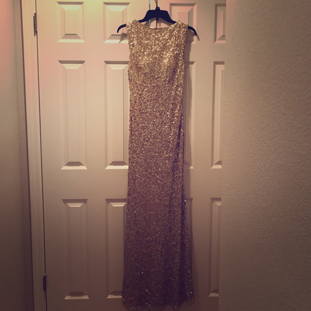 Size 6 Gold sequence Primavera Gown.