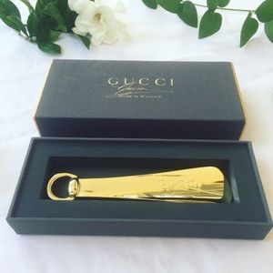Gold Gucci horse-bit shoe horn