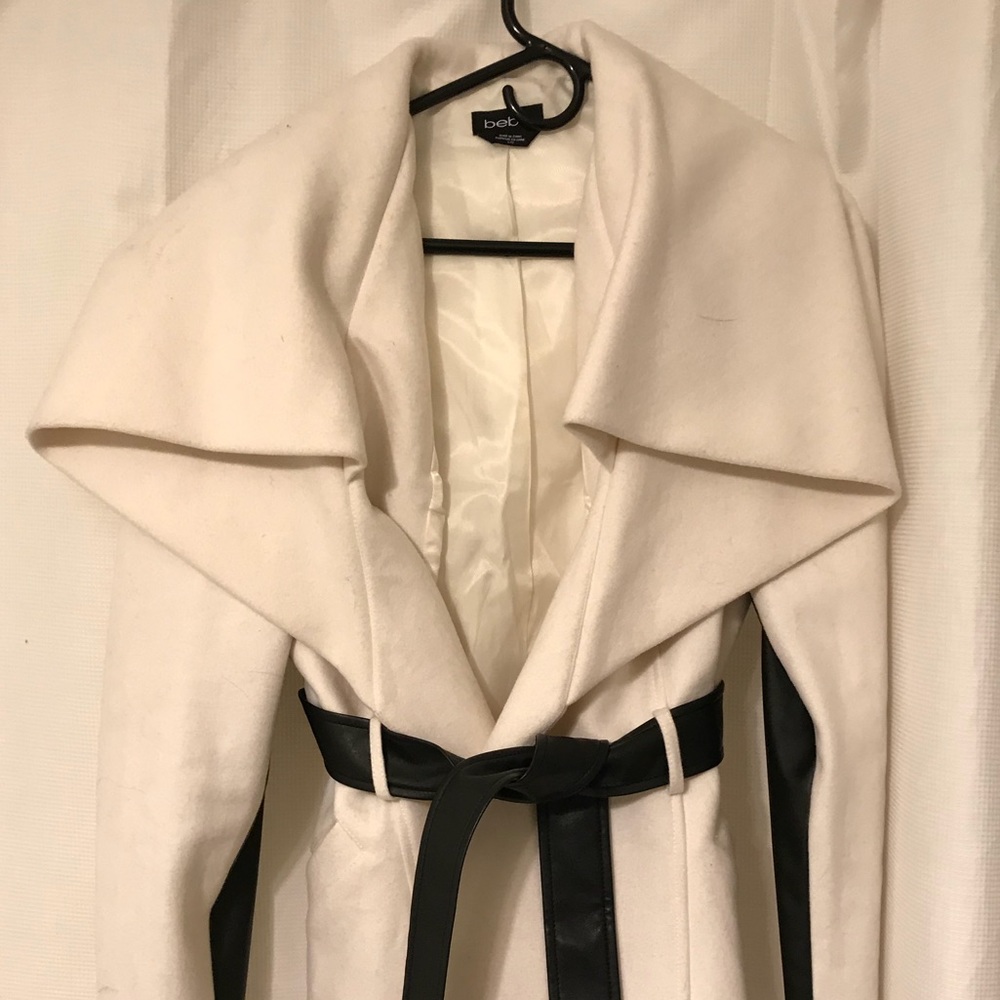White jacket with black leather details