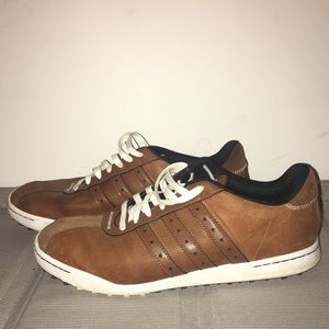 Men's adidas golf shoes and dress shoes.