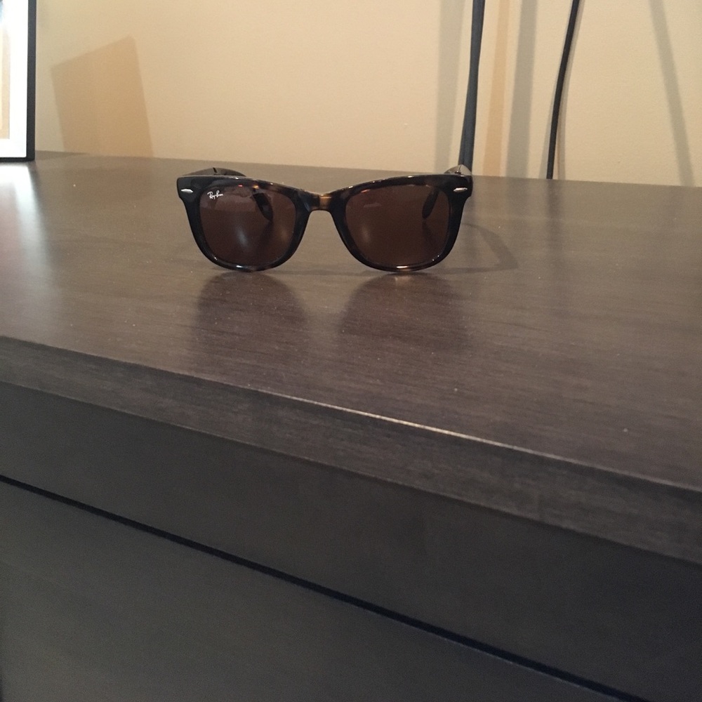 Rayban sunglasses.